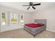 Bedroom with bay window and neutral carpet, offering comfortable living at 2324 Dahlgreen Rd, Raleigh, NC 27615