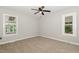 Bedroom with two windows and ample natural light at 2324 Dahlgreen Rd, Raleigh, NC 27615