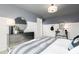 Charming bedroom with accent wall, comfortable furnishings, carpet, and dark dresser at 254 Macon Lake Drive # 34, Apex, NC 27523