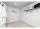 Spacious walk-in closet with shelving and racks for ample storage, carpeted floors at 254 Macon Lake Drive # 34, Apex, NC 27523