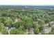 Lush trees surround beautiful homes in this charming neighborhood, offering a serene and private setting at 2629 Hiking Trl, Raleigh, NC 27615