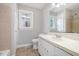Bathroom featuring tiled floors, a white vanity with mirror, and a separate shower area at 2629 Hiking Trl, Raleigh, NC 27615