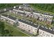 Aerial view of a neighborhood with modern townhomes, lush landscaping, and community spaces at 2808 Kempthorne Rd # 61, Cary, NC 27519