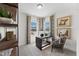 Inviting home office featuring a modern desk setup, comfortable seating, and bright windows with pleasant views at 2808 Kempthorne Rd # 61, Cary, NC 27519