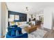 Open-concept living room flows into the kitchen, featuring elegant furnishings and modern decor at 2808 Kempthorne Rd # 61, Cary, NC 27519