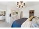 Comfortable main bedroom featuring a stylish dresser, decorative accents, and ample closet space at 2808 Kempthorne Rd # 61, Cary, NC 27519