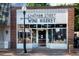 Chatham Street Wine Market features a brick facade and glass windows on a tree-lined street at 2808 Kempthorne Rd # 61, Cary, NC 27519