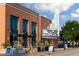 Exterior of the Cary Theater with marquee, outdoor seating, and classic architectural details at 2808 Kempthorne Rd # 61, Cary, NC 27519