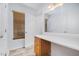 Bright bathroom featuring a vanity with drawers, a large mirror, and ample natural light from a window at 2817 Henslowe Dr, Raleigh, NC 27603