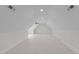 Spacious attic featuring modern recessed lighting, offering versatile potential as a bonus room at 3104 Whitehart Ln, Apex, NC 27539