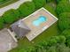 Aerial view of the community pool and sundeck with lounge chairs at 3104 Whitehart Ln, Apex, NC 27539