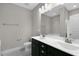 Bathroom with double sink vanity and updated fixtures at 32 Iroquois Ct, Garner, NC 27529