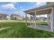 View of the covered patio and spacious backyard at 32 Iroquois Ct, Garner, NC 27529