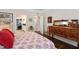 Comfortable bedroom with view into the walk-in closet and stylish furnishings at 323 Rosedale Creek Dr, Durham, NC 27703