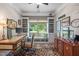 Traditional home office with built-in shelves and a window seat with a lake view at 323 Rosedale Creek Dr, Durham, NC 27703