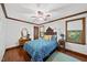 Bedroom features hardwood floors, ceiling fan, and lots of natural light at 3412 Paddock Cir, Raleigh, NC 27613
