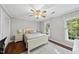 Inviting bedroom with a neutral palette, ceiling fan, and bright windows at 3412 Paddock Cir, Raleigh, NC 27613