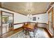 Traditional dining room with wood table, decorative rug, and chandelier at 3412 Paddock Cir, Raleigh, NC 27613