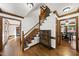 Inviting foyer with hardwood floors, staircase, and traditional trim at 3412 Paddock Cir, Raleigh, NC 27613