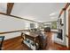 Spacious living room with hardwood floors, comfortable seating, and a decorative fireplace at 3412 Paddock Cir, Raleigh, NC 27613
