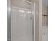 Bathroom shower with glass door and modern shower head, next to soaking tub at 3526 Londonville Ln, Raleigh, NC 27604