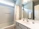 Bathroom features a vanity, shower and tub, and a large mirror at 3709 Andoversford Ct, Wake Forest, NC 27587