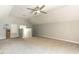 Large bonus room with a ceiling fan and carpeting offers an open concept at 3709 Andoversford Ct, Wake Forest, NC 27587