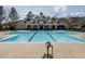 Large community pool with clear blue water and ample space for relaxation and recreation at 3709 Andoversford Ct, Wake Forest, NC 27587