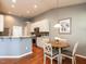Kitchen with eat-in dining area with a round table, and stainless steel appliances at 3709 Andoversford Ct, Wake Forest, NC 27587