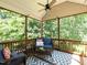 Relaxing screened porch with wicker furniture, an outdoor rug, and views of backyard at 3709 Andoversford Ct, Wake Forest, NC 27587
