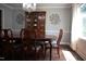 Charming dining room featuring a chandelier, wood furniture, and natural light at 408 Greenfern Ct, Burlington, NC 27215