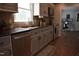Modern kitchen featuring stainless steel appliances, granite countertops, and ample cabinet space at 408 Greenfern Ct, Burlington, NC 27215
