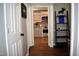 Bright kitchen with stainless steel appliances and white cabinets, offering a modern cooking space at 408 Greenfern Ct, Burlington, NC 27215