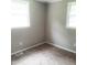 Cozy bedroom with plush carpet, neutral paint, and well-lit window views at 4112 Forrest Ave, Efland, NC 27243