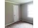 Neutral bedroom with a window for natural light and carpet flooring at 4112 Forrest Ave, Efland, NC 27243