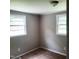 Cozy bedroom featuring two windows for natural light at 4112 Forrest Ave, Efland, NC 27243