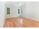 Light and airy bedroom with hardwood floors, ceiling fan and great natural light at 4305 Heathgate Ln, Raleigh, NC 27613