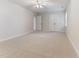 Neutral-colored bedroom with double door closet and connecting room with a view at 4305 Heathgate Ln, Raleigh, NC 27613