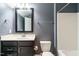This full bath features a vanity and a shower and tub combination at 5305 Yorkville Ct, Holly Springs, NC 27540