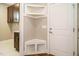 Convenient mudroom featuring built-in storage, cubbies, and direct access to the laundry area at 5305 Yorkville Ct, Holly Springs, NC 27540