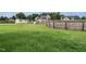 Large backyard features a storage shed and playset, perfect for outdoor enjoyment at 5400 Falconton Ln, Raleigh, NC 27610