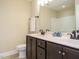 Bathroom with double sink vanity and toilet at 5400 Falconton Ln, Raleigh, NC 27610