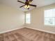 Empty bedroom with carpet and two windows at 5400 Falconton Ln, Raleigh, NC 27610