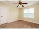 Bedroom with window and ceiling fan at 5400 Falconton Ln, Raleigh, NC 27610