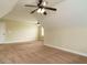 Bright bedroom featuring carpet, neutral walls, and natural light at 5400 Falconton Ln, Raleigh, NC 27610