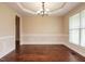 Elegant dining room with beautiful moldings and hardwood floors at 5400 Falconton Ln, Raleigh, NC 27610