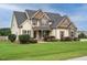 A beautiful house with a manicured lawn and mature landscaping at 5400 Falconton Ln, Raleigh, NC 27610