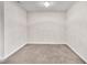 Versatile room with neutral walls, carpet, and a modern light fixture, perfect for customization at 5617 Tealbrook Dr, Raleigh, NC 27610