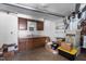 Basement room with a sink and unfinished flooring next to furnace at 5918 Efland Cedar Grove Rd, Cedar Grove, NC 27231