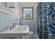 Bathroom featuring an updated vanity, a new shower curtain, and a window at 5918 Efland Cedar Grove Rd, Cedar Grove, NC 27231